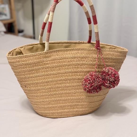 LOFT Woven Tan Tote with Red and Cream Pom Pom Accents - Picture 4 of 10